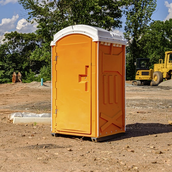 how often are the portable restrooms cleaned and serviced during a rental period in Parkman WY